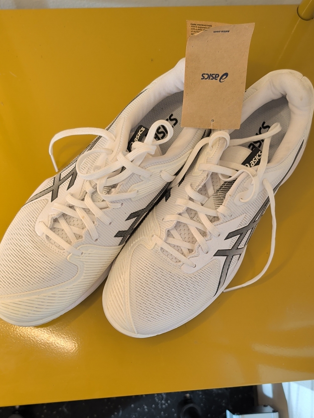 ASICS Men's White Athletic Sneakers with Black Detailing